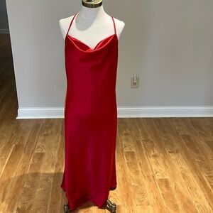 - Bebe red satin slip dress made is the USA size L